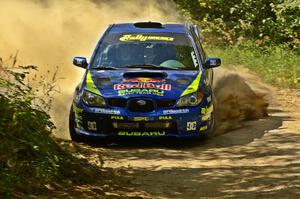 Travis Pastrana / Christian Edstrom Subaru WRX STi at SS12 just after the double jump.