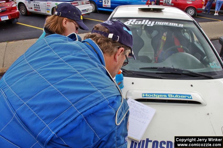 Jeff Secor and Cindy Krolikowski get together to file a protest just before the start of day two.