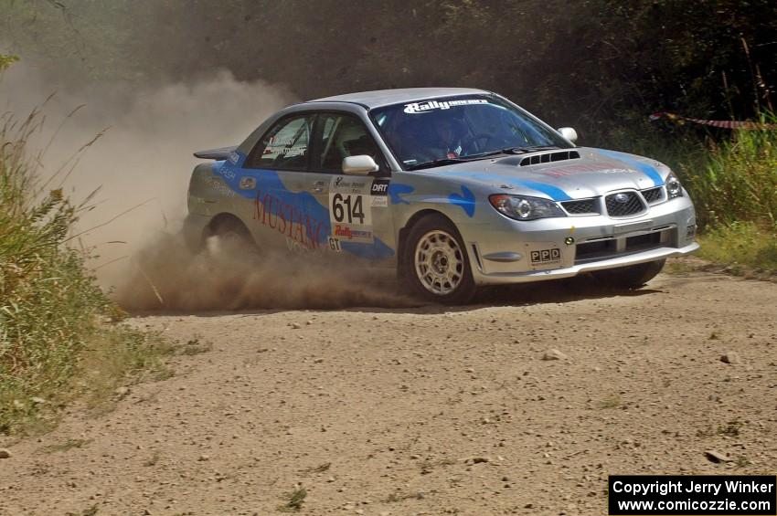 Piotr Wiktorczyk / Martin Brady prepare for a 90-left in their Subaru WRX on SS9.