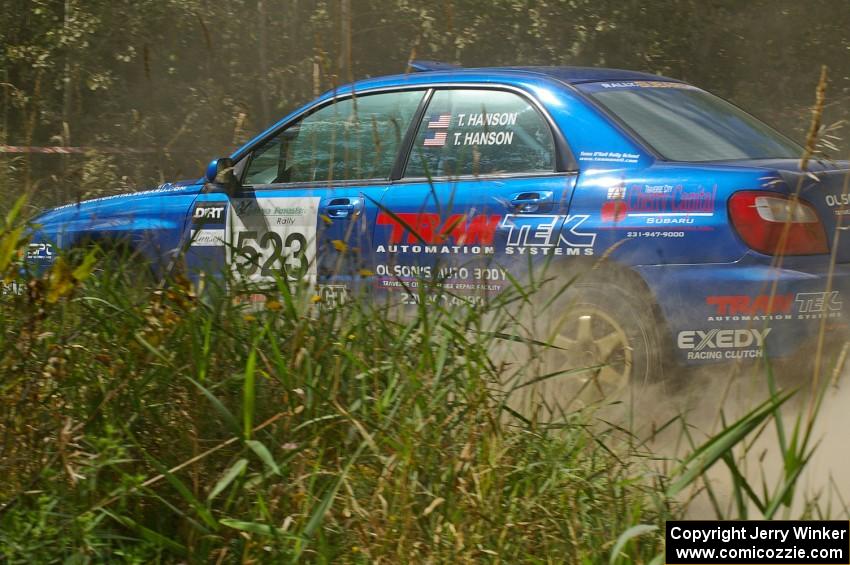 Travis Hanson / Terry Hanson Subaru Impreza WRX take a 90-left on SS9.