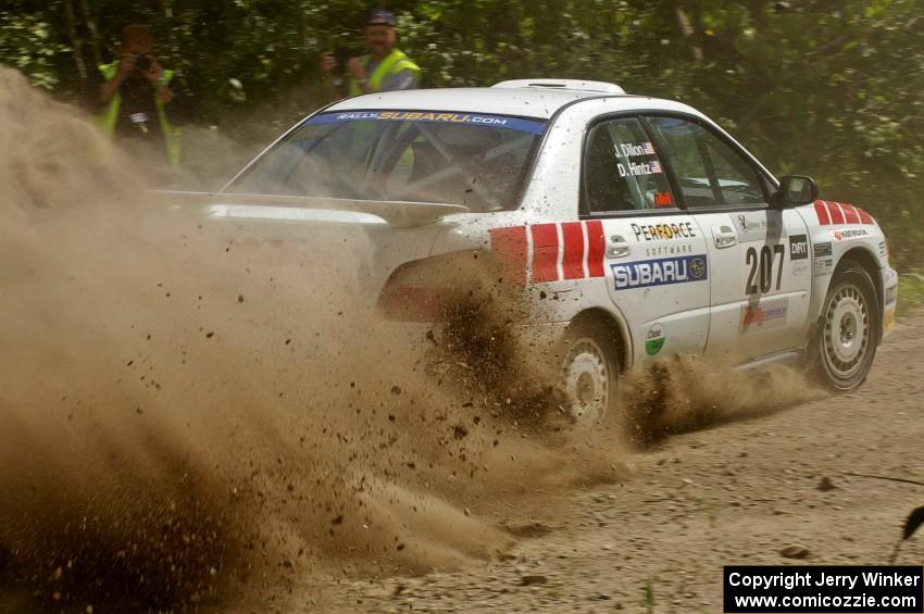 Dave Hintz / John Dillon Subaru WRX sling gravel at the exit of a corner on SS9.