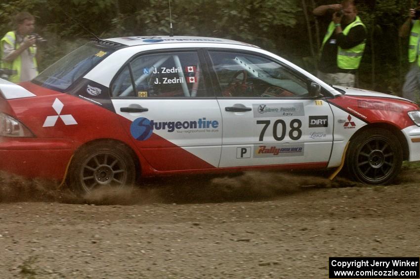 Jan Zedril / Jody Zedril Mitsubishi Lancer ES is barely visible through the dust on SS9.