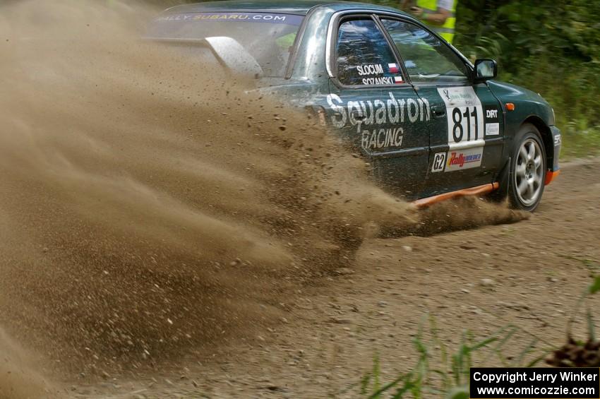 Jaroslaw Sozanski / Ben Slocum Subaru Impreza slings gravel at the SS9 spectator point (2).