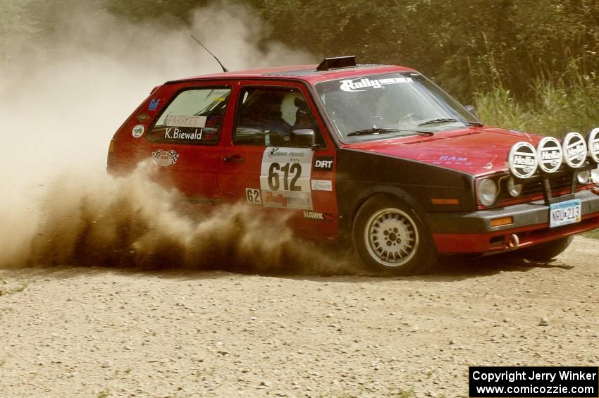 Karl Biewald / Scott Parrott VW GTI slings gravel on SS9 (1).