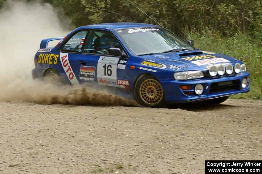 Kazimierz Pudelek / Mariusz Malik Subaru Impreza at the SS9 spectator point (1).