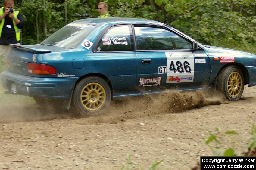 Martin Mennig / Ryan Schnell Subaru Impreza at the SS9 spectator point (2).