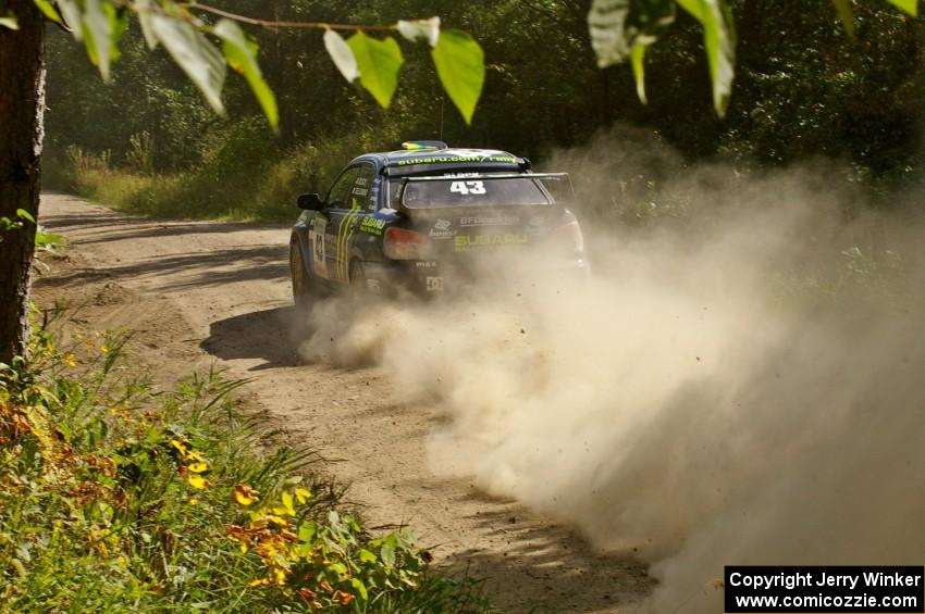 Ken Block / Alex Gelsomino Subaru WRX STi rockets away down a long straight on SS12.