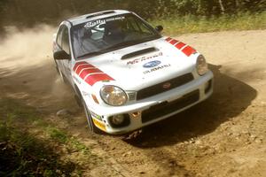 Dave Hintz / John Dillon Subaru WRX at a 90-right on SS12.