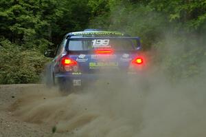 Travis Pastrana / Christian Edstrom Subaru WRX STi on SS15 near the midpoint.