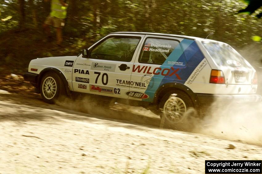 Chris Duplessis / Martin Headland VW GTI take an uphill 90-right on SS12.
