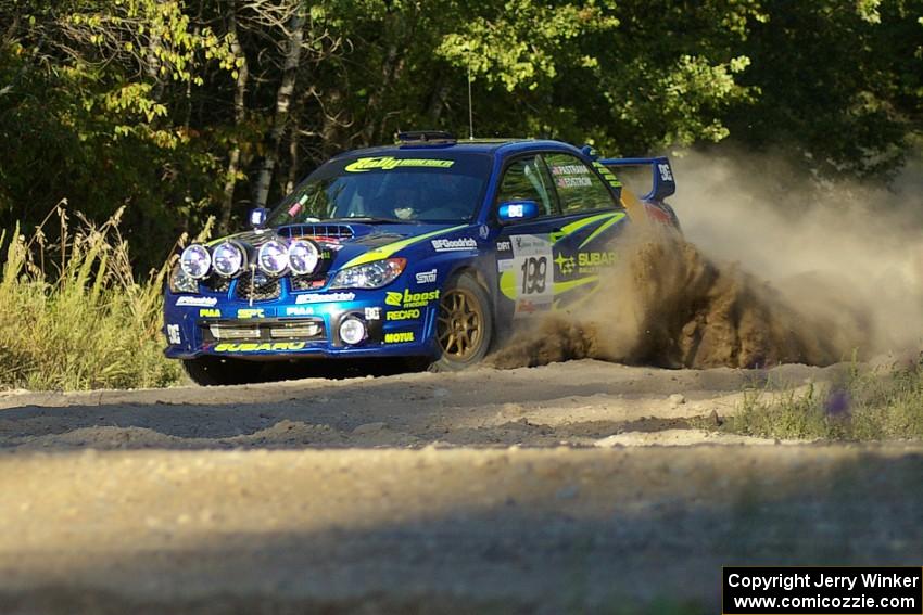 Travis Pastrana / Christian Edstrom Subaru WRX STi on SS13 at the spectator point (1).