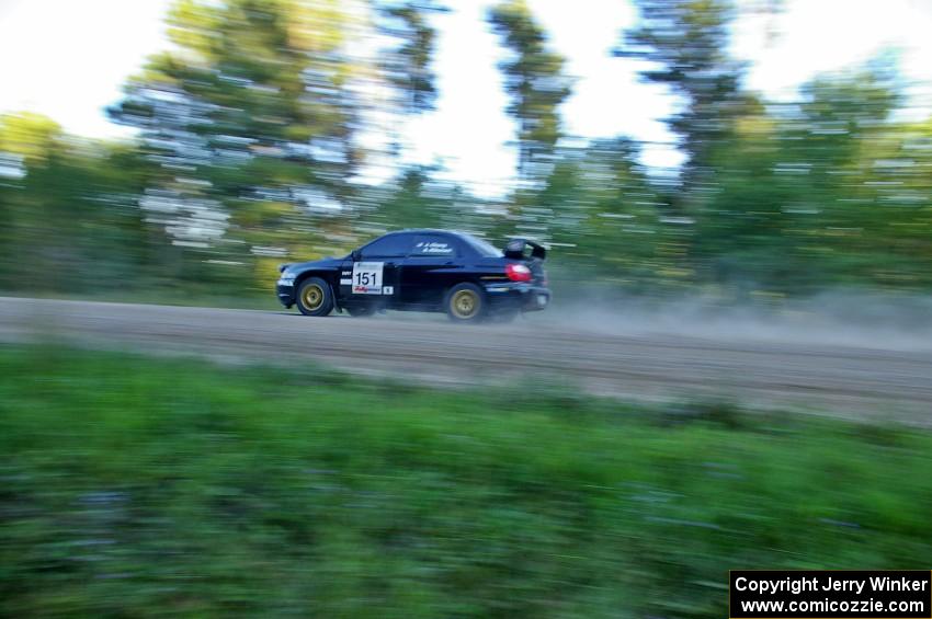 Josh Chang / Alex Kihurani Subaru WRX STi on a straight on SS13.