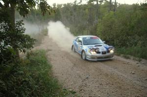 Piotr Wiktorczyk / Martin Brady gain the lead in PGT on SS15 in their Subaru WRX.