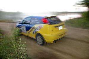 Kyle Sarasin / Mikael Johansson at speed on SS15 in their Ford Focus SVT.