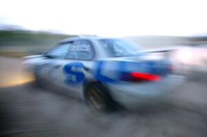 Henry Krolikowski / Cindy Krolikowski Subaru Impreza at speed on SS15.