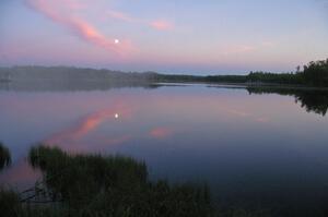 Moonrise at sunset over McKenzie Lake.