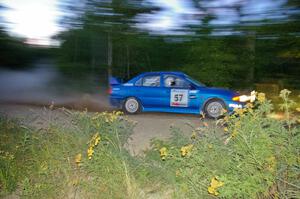 Dmitri Kishkarev / Hugh Hutchinson Mitsubishi Lancer Evo 4 on SS15.