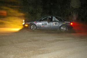 Dan Adamson / Chris Gordon Saturn SL2 almost took a wrong turn at a 90-left on SS15.