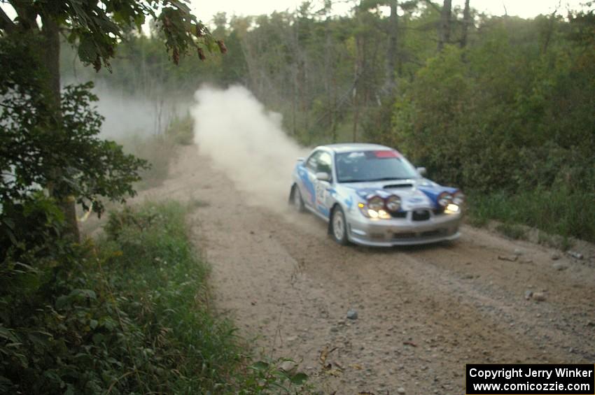 Piotr Wiktorczyk / Martin Brady gain the lead in PGT on SS15 in their Subaru WRX.