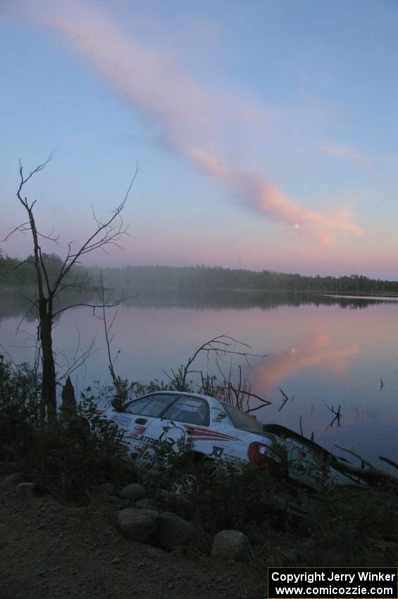 The Stephan Verdier / Scott Crouch Subaru WRX was off the road and stuck firmly atop a rockpile on the edge of McKenzie Lake.