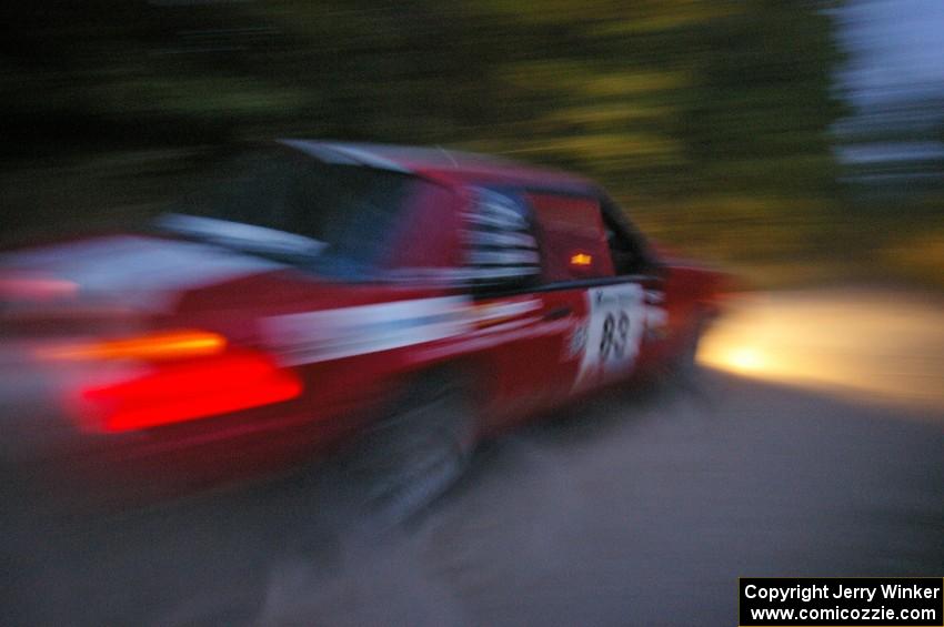 Mark Utecht / Rob Bohn Ford Mustang on SS15 after sundown.