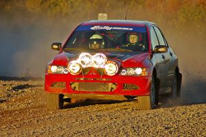 Amy BeberVanzo / Alex Kihurani Mitsubishi Lancer Evo 8 on the practice stage on Thursday.