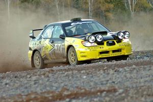 Tanner Foust / Chrissie Beavis Subaru WRX on the practice stage (1).