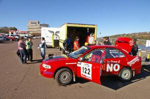 Dennis Martin / Kim DeMotte Mitsubishi Lancer Evo IV gets last minute prep before parc expose.