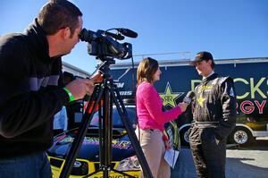 Andy Pinker gets interviewed prior to the start of the rally.