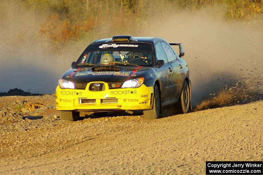 Andy Pinker / Robbie Durant Subaru WRX STi heads into the sun on the practice stage.
