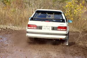 Erik Zenz / Dave Parps Mazda 323GTX on SS1.