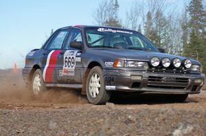 Evan Cline / Jason Grahn Mitsubishi Galant on SS1.