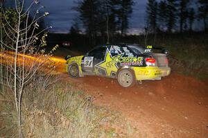 Tanner Foust / Chrissie Beavis Subaru WRX on rockets through the final corner of Echo Lake 1, SS4.