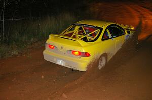 Evan Moen / Dan Victor in their Acura Integra Type-R sling gravel on the final corner of SS4, Echo Lake 1.