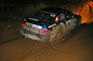 Kazimierz Pudelek / Maciej Wislawski Subaru Impreza slings gravel on the final corner of Echo Lake 1, SS4.