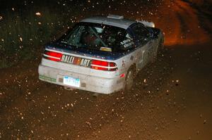 Paul Ritchie / Drew Ritchie Mitsubishi Eclipse GSX slings gravel on SS4, Echo Lake 2.