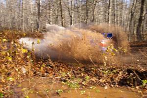 Kenny Bartram / Dennis Hotson Subaru WRX hits a puddle at speed on Gratiot Lake 1, SS9.