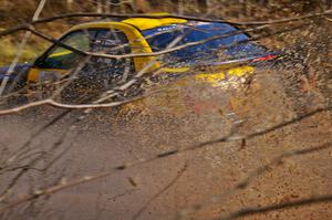 Jaroslaw Sozanski / Catherine Woods Subaru WRX hit a puddle at speed on Gratiot Lake 1, SS9.