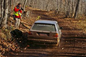 Dave Cizmas / Matt Himes VW GTI blast through a corner on Gratiot Lake 1, SS9, while Ken Friberg takes a shot.