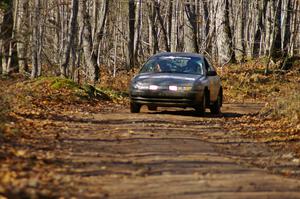 Dan Adamson / Chris Gordon Saturn SL2 at the finish of Gratiot Lake 1, SS9.