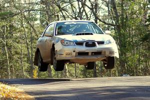 Piotr Wiktorczyk / Martin Brady	Subaru WRX catch air at the midpoint yump on Brockway 1, SS12.