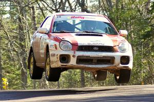 Justin Pritchard / Bill Westrick Subaru WRX catch air on the midpoint jump on Brockway Mountain, SS13.