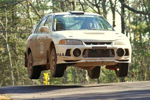 Charles Sherrill / Wilson VonKessler Mitsubishi Evo IV cathes air at the midpoint yump on Brockway 1, SS12.