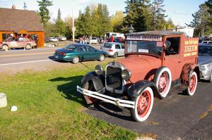 Matt Bushore / Andy Bushore VW Jetta gets serviced in Copper Harbor across the street from a Ford Model "T" pickup.