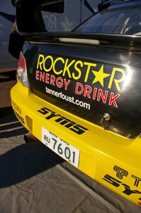 Tanner Foust / Chrissie Beavis Subaru WRX idles on the jack stands at Copper Harbor service.