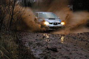 Piotr Wiktorczyk / Martin Brady Subaru WRX hit the big puddle near the end of Gratiot Lake 2, SS16.