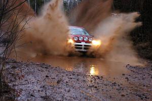 Doug Shepherd / Karen Wagner Dodge SRT-4 hits the final puddle near the finish of Gratiot Lake 2, SS16.