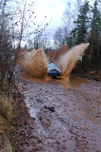 Cary Kendall / Scott Friberg Dodge SRT-4 hits a large puddle near the finish of Gratiot Lake 2, SS16.