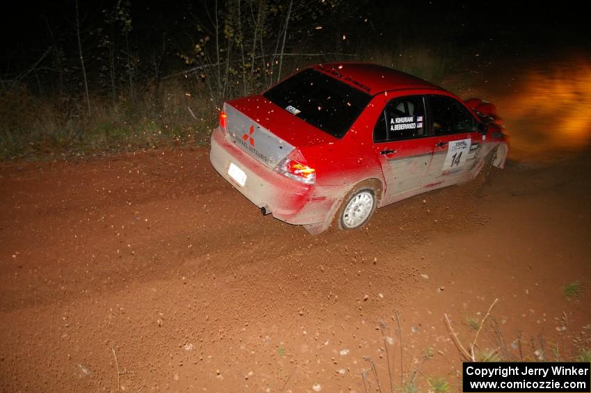 Amy BeberVanzo / Alex Kihurani Mitsubishi Lancer Evo 8 goes through the final corner of Echo Lake 1, SS4.