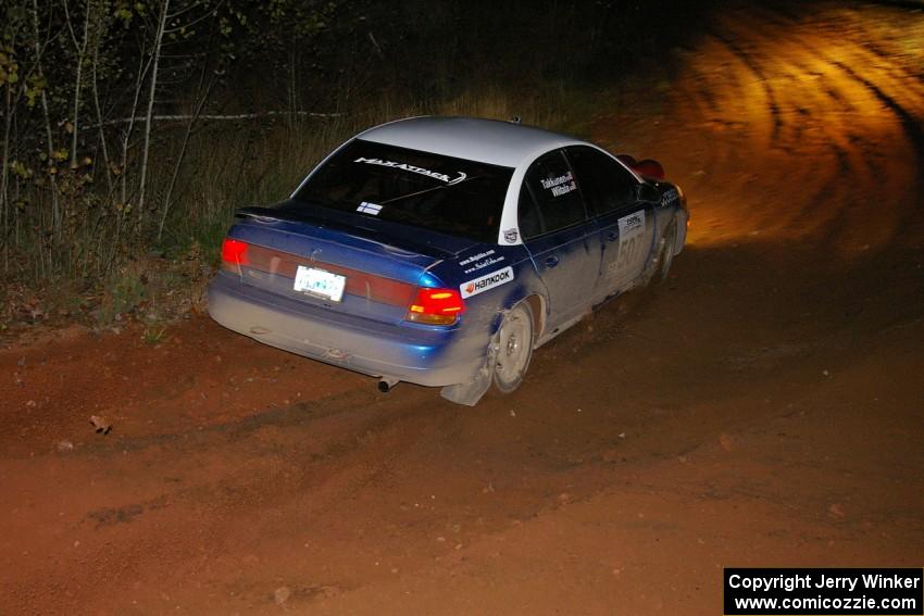Micah Wiitala / Jason Takkunen Saturn SL2 on the final corner of Echo Lake 1, SS4. They DNF'ed on day two.
